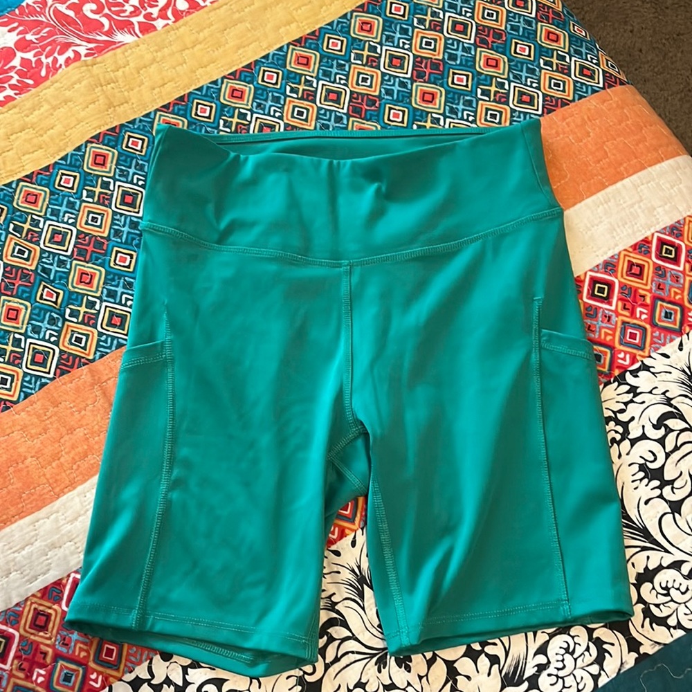 All in motion green biker shorts with pockets